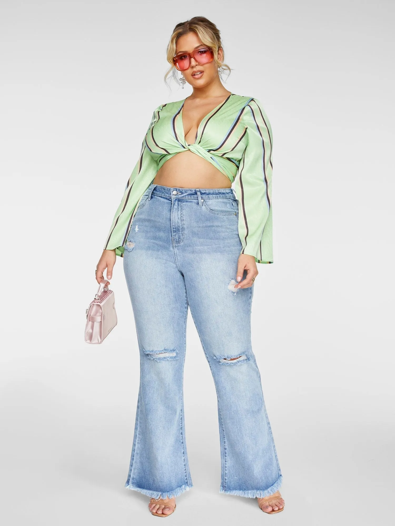 High Rise Destructed Light Wash Flare Jeans