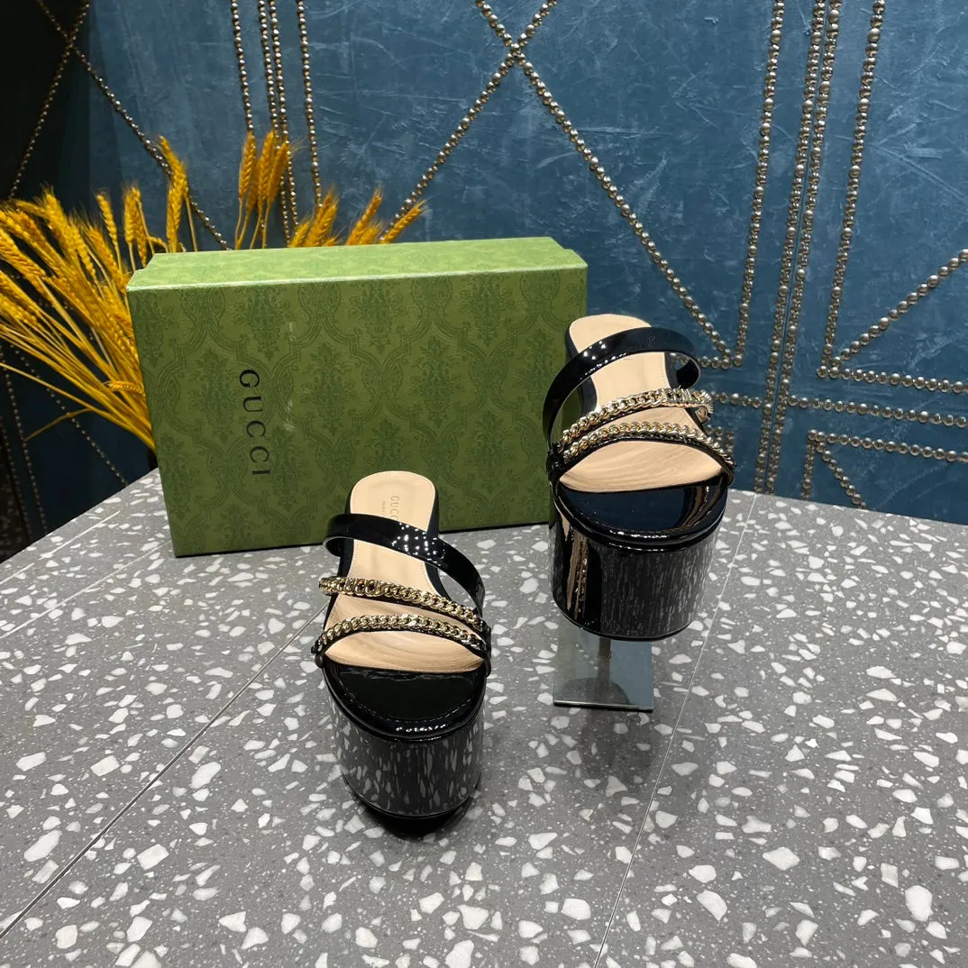 HIGH WEDGE PLATFORM IN BLACK CALFSKIN WITH GOLD HARDWARE