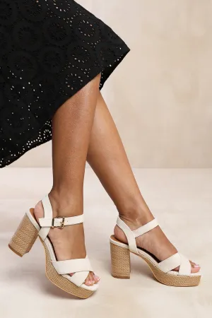 VOLUME PLATFORM BLOCK HIGH HEELS WITH CROSS OVER STRAPS IN LIGHT CREAM SUEDE